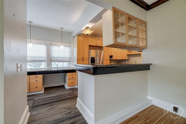 215 E 45th St, Savannah, GA 31405 - kitchen featuring stainless steel fridge with ice dispenser, dark wood-style floors, light brown cabinetry, dark countertops, and glass insert cabinets