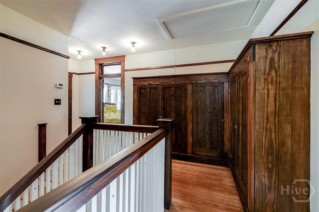 215 E 45th St, Savannah, GA 31405 - hall featuring an upstairs landing, light wood-style floors, and attic access