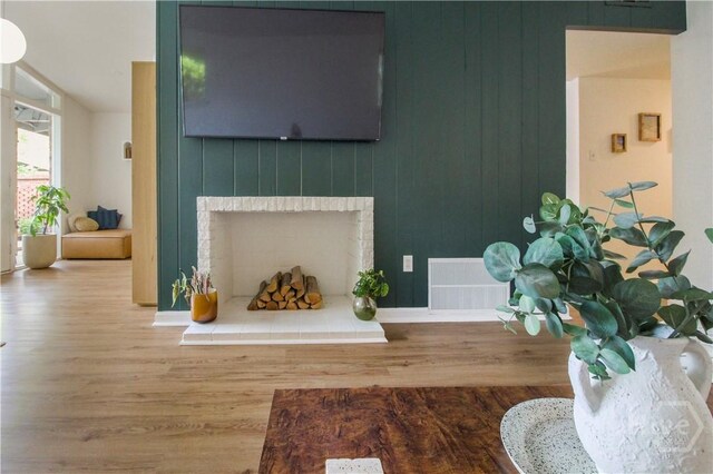 320 Windsor Rd, Savannah, GA 31419 - living room with wood finished floors and a fireplace
