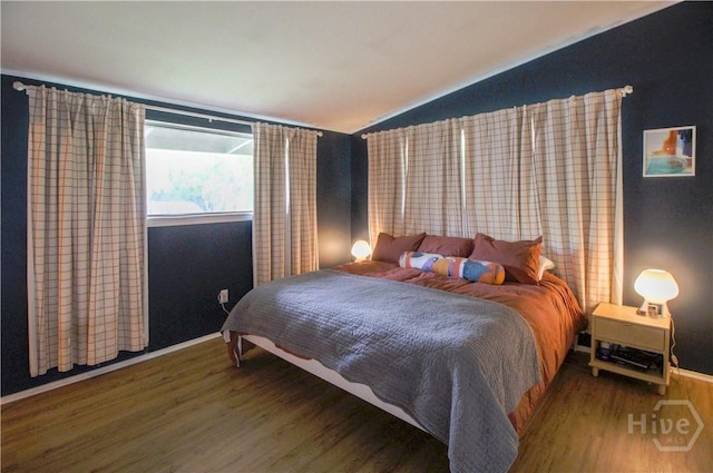 320 Windsor Rd, Savannah, GA 31419 - bedroom featuring vaulted ceiling and wood finished floors