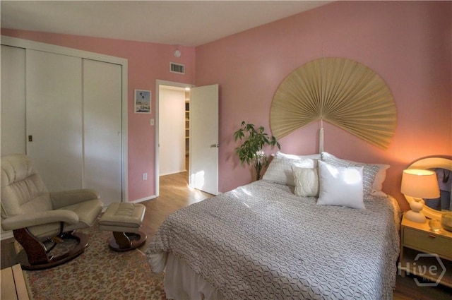 320 Windsor Rd, Savannah, GA 31419 - bedroom featuring a closet, wood finished floors, and lofted ceiling