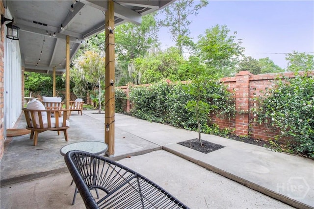 320 Windsor Rd, Savannah, GA 31419 - fenced backyard with a patio