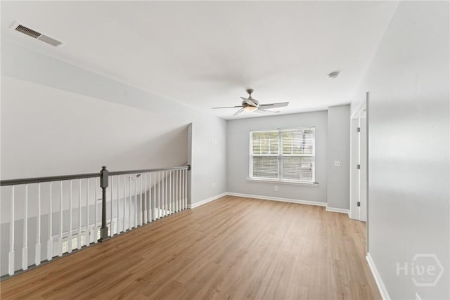 146 Royal Ln, Pooler, GA 31322 - spare room featuring light wood-type flooring and a ceiling fan