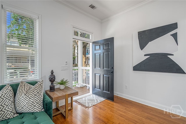 316 E 31st St, Savannah, GA 31401 - foyer featuring wood finished floors and ornamental molding
