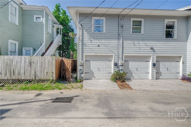 316 E 31st St, Savannah, GA 31401 - back of property with an attached garage and driveway