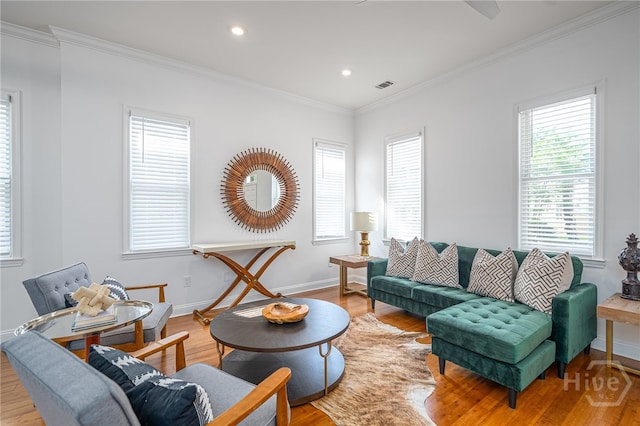 316 E 31st St, Savannah, GA 31401 - living area with crown molding, healthy amount of natural light, wood finished floors, and recessed lighting