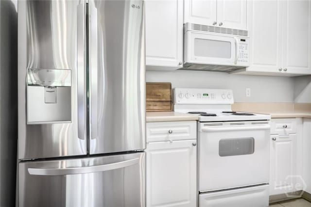 1212 Whitemarsh Way, Savannah, GA 31410 - kitchen with white appliances, light countertops, and white cabinetry