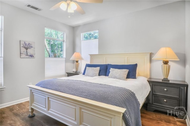 1212 Whitemarsh Way, Savannah, GA 31410 - bedroom with dark wood-type flooring and ceiling fan