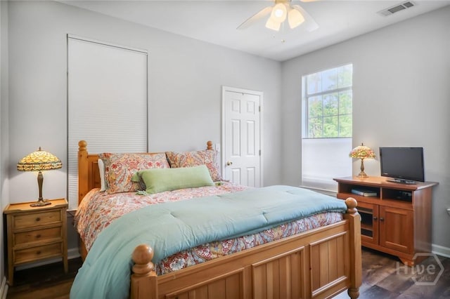 1212 Whitemarsh Way, Savannah, GA 31410 - bedroom with dark wood-style flooring and a ceiling fan
