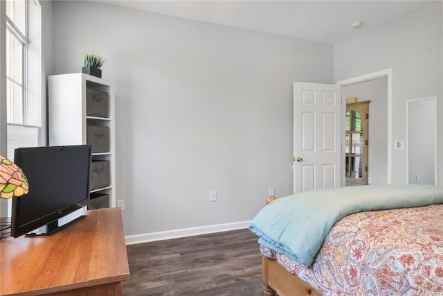 1212 Whitemarsh Way, Savannah, GA 31410 - bedroom featuring dark wood-type flooring and multiple windows