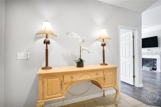 1212 Whitemarsh Way, Savannah, GA 31410 - office space featuring light tile patterned floors and a glass covered fireplace