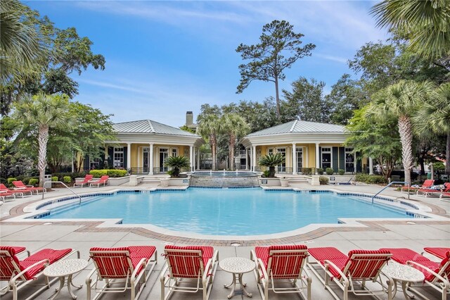 1212 Whitemarsh Way, Savannah, GA 31410 - view of pool with a patio area and a pool with connected hot tub