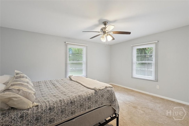 406 E 3rd St, Springfield, GA 31329 - bedroom with light carpet and ceiling fan