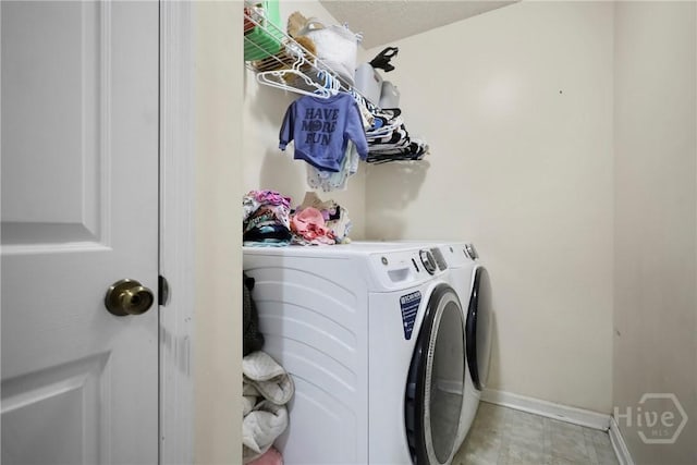 316 Clairemore Cir, Hinesville, GA 31313 - washroom featuring independent washer and dryer and baseboards