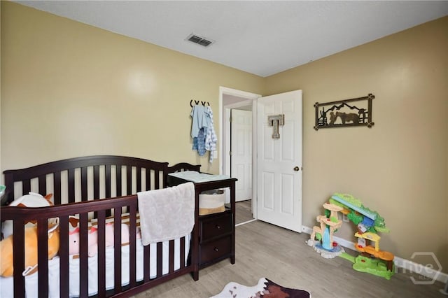 316 Clairemore Cir, Hinesville, GA 31313 - bedroom with wood finished floors and baseboards