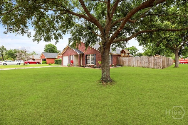 316 Clairemore Cir, Hinesville, GA 31313 - single story home featuring a garage, concrete driveway, and brick siding
