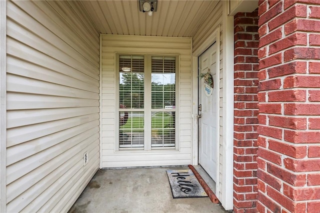 316 Clairemore Cir, Hinesville, GA 31313 - property entrance featuring brick siding and covered porch