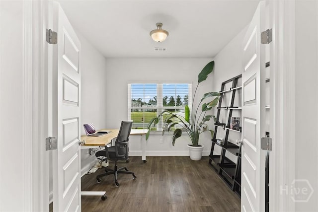104 Finch Ln, Guyton, GA 31312 - home office featuring dark wood-style floors and baseboards