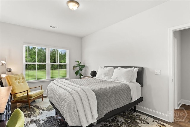 104 Finch Ln, Guyton, GA 31312 - bedroom with baseboards and wood finished floors