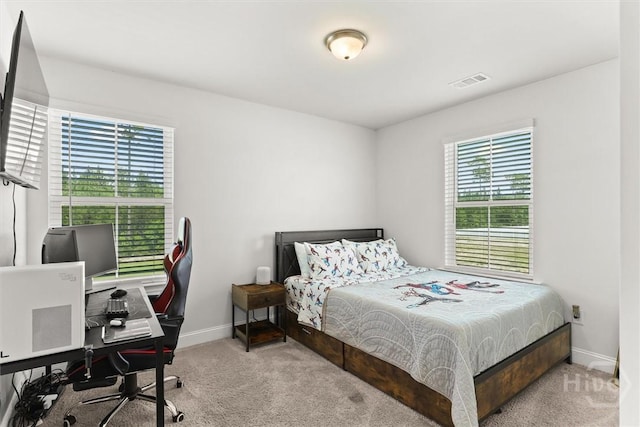 104 Finch Ln, Guyton, GA 31312 - carpeted bedroom featuring baseboards and a desk
