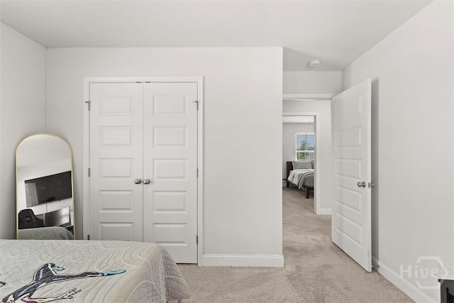 104 Finch Ln, Guyton, GA 31312 - bedroom with light carpet and a closet