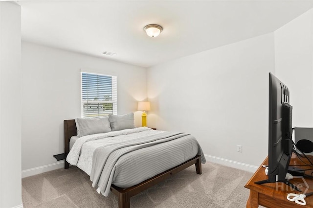 104 Finch Ln, Guyton, GA 31312 - carpeted bedroom featuring baseboards