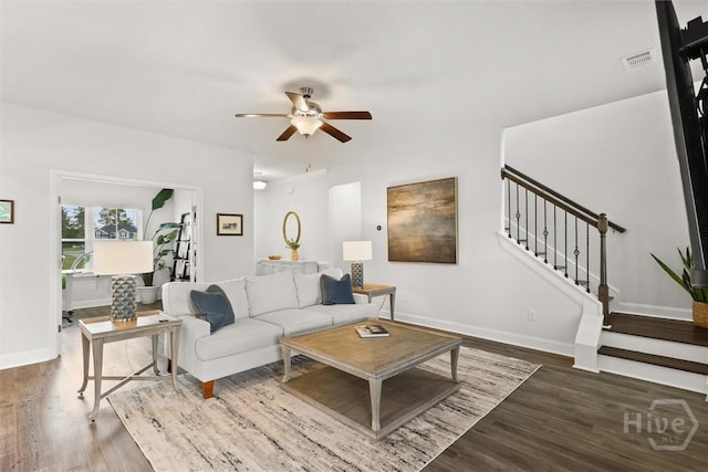 104 Finch Ln, Guyton, GA 31312 - living area with stairs, wood finished floors, and ceiling fan