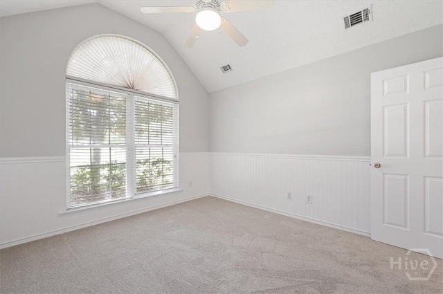 65 Golden Gate Dr, Pooler, GA 31322 - carpeted spare room featuring lofted ceiling, a ceiling fan, and wainscoting