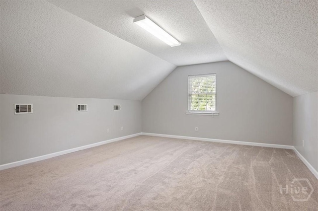 65 Golden Gate Dr, Pooler, GA 31322 - bonus room featuring a textured ceiling, light colored carpet, and vaulted ceiling