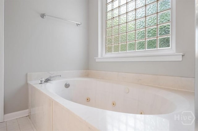 65 Golden Gate Dr, Pooler, GA 31322 - full bath featuring a tub with jets and tile patterned floors
