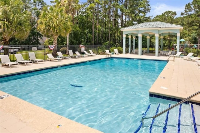 65 Golden Gate Dr, Pooler, GA 31322 - community pool with a gazebo and a patio area