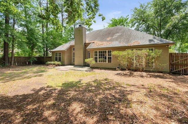 65 Golden Gate Dr, Pooler, GA 31322 - back of property featuring a patio area and a chimney