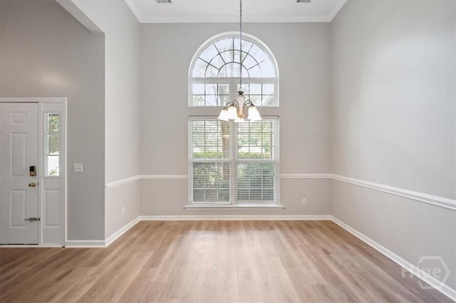 65 Golden Gate Dr, Pooler, GA 31322 - entryway with a chandelier, light wood-style flooring, and ornamental molding
