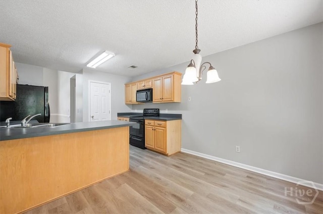 65 Golden Gate Dr, Pooler, GA 31322 - kitchen with black appliances, light brown cabinets, light wood-style flooring, and a textured ceiling