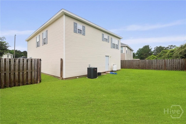 15 Springwater Dr, Port Wentworth, GA 31407 - view of side of property with a fenced backyard and a central AC unit