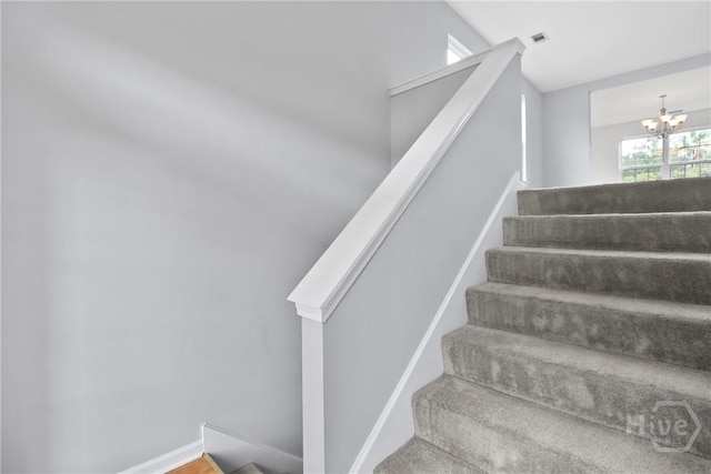 15 Springwater Dr, Port Wentworth, GA 31407 - stairs featuring a chandelier