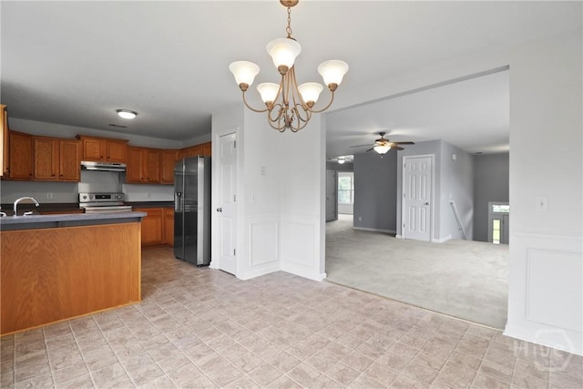 15 Springwater Dr, Port Wentworth, GA 31407 - kitchen featuring appliances with stainless steel finishes, under cabinet range hood, a chandelier, ceiling fan, and open floor plan