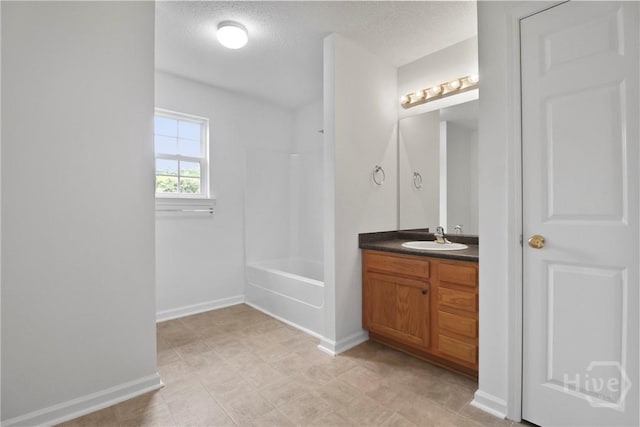 15 Springwater Dr, Port Wentworth, GA 31407 - bathroom with vanity, bathing tub / shower combination, and a textured ceiling