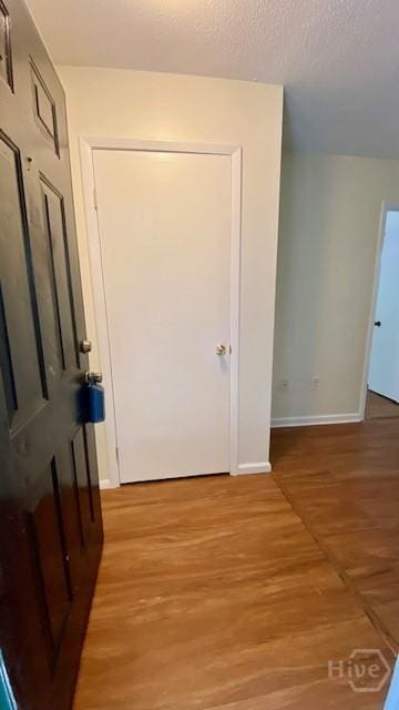 401 N Cromwell Rd Unit G1, Savannah, GA 31410 - corridor featuring baseboards and light wood-style floors