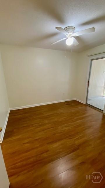 401 N Cromwell Rd Unit G1, Savannah, GA 31410 - empty room featuring wood finished floors and a ceiling fan