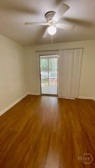401 N Cromwell Rd Unit G1, Savannah, GA 31410 - empty room with wood finished floors, a ceiling fan, and a textured ceiling