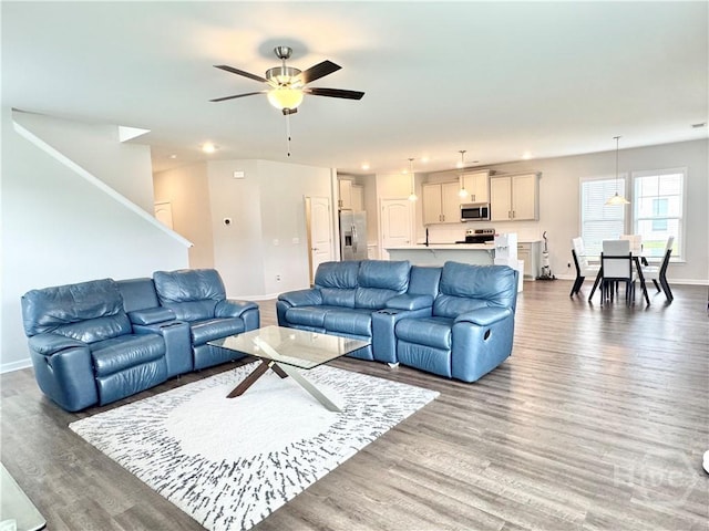 135 Melody Dr, Pooler, GA 31322 - living room with a ceiling fan, wood finished floors, and recessed lighting