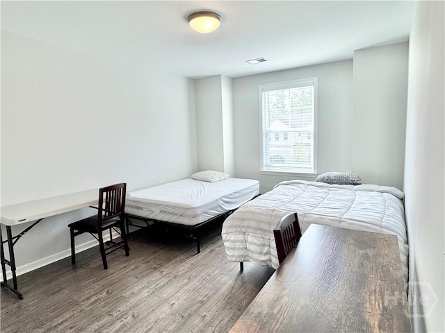 135 Melody Dr, Pooler, GA 31322 - bedroom with wood finished floors and baseboards