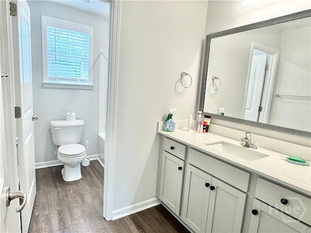 135 Melody Dr, Pooler, GA 31322 - bathroom with wood finished floors, vanity, and shower / bathtub combination