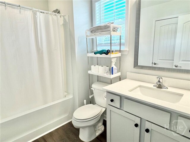 135 Melody Dr, Pooler, GA 31322 - bathroom featuring vanity, wood finished floors, and shower / bath combo with shower curtain