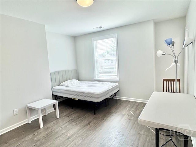 135 Melody Dr, Pooler, GA 31322 - bedroom featuring wood finished floors and baseboards