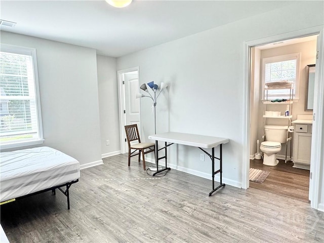 135 Melody Dr, Pooler, GA 31322 - bedroom featuring light wood finished floors and connected bathroom