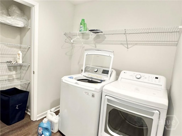 135 Melody Dr, Pooler, GA 31322 - laundry room with washer and clothes dryer and dark wood finished floors