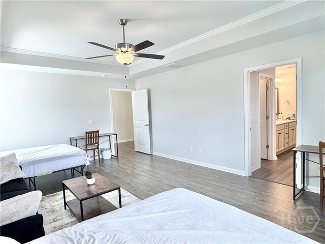 135 Melody Dr, Pooler, GA 31322 - bedroom with wood finished floors, ornamental molding, a raised ceiling, and ceiling fan