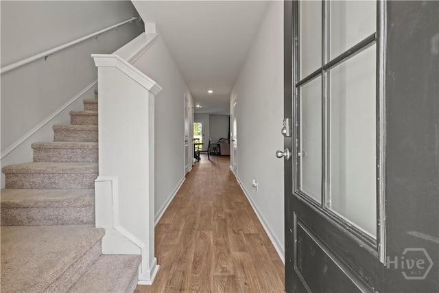 206 Coneflower Rd, Bloomingdale, GA 31302 - hallway with wood finished floors, stairway, and recessed lighting